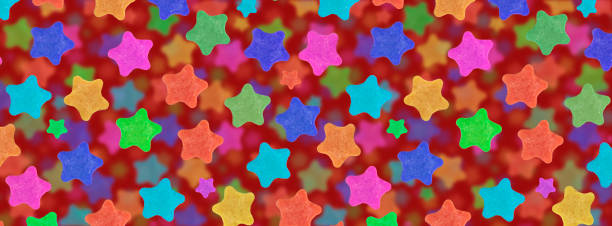 休日の星のパターン。赤い背景、広いバナーに明るい色の星。 - star shape confetti red nobody ストックフォトと画像