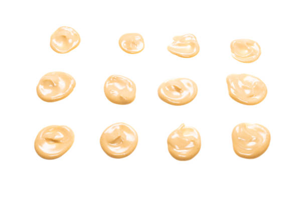 istock Mushroom sauce splashes isolated on white background. 1312490987