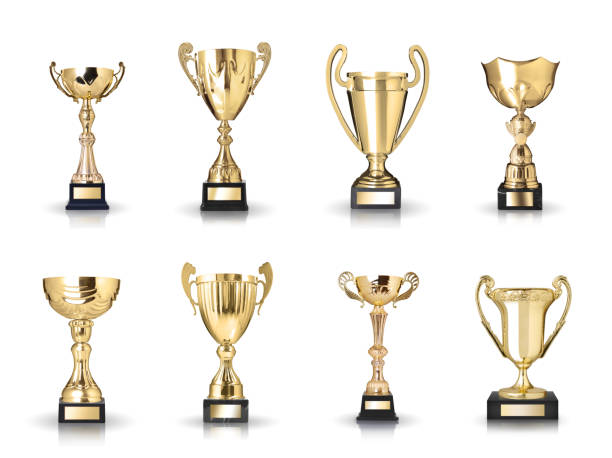 Set of golden trophies. Isolated on white background Set of golden trophies. Isolated on white background championship stock pictures, royalty-free photos & images