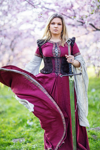 istock Beautiful Russian woman in a cherry tree forest 1312495370