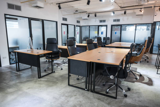 istock Closed empty modern office coworking space and policy for employees to work from home during pandemic of Covid-19, Coronavirus 1312497085