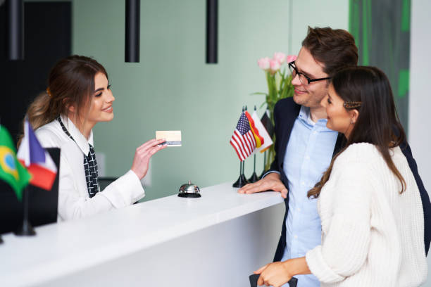 istock Adult couple checking-in a hotel 1312498903