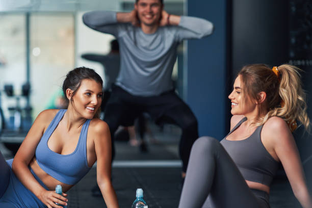 istock Group of people working out in a gym 1312499800