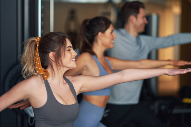 istock Group of people working out in a gym 1312499838