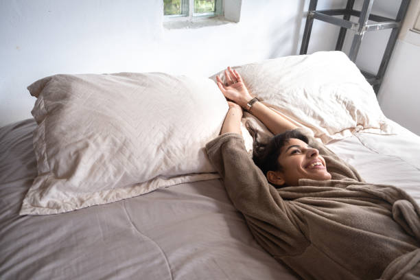 istock Young woman resting lying in bed 1312501070