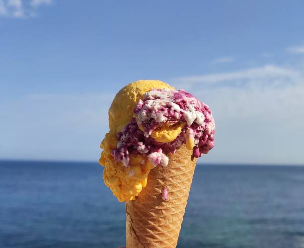 istock Mango and red velvet ice cream in the beach 1312501107