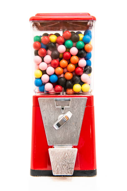 Traditional coin-operated gumball machine Traditional coin-operated gumball machine filled with multi coloured balls of chewing gum gobstoppers jawbreakers old candy store stock pictures, royalty-free photos & images