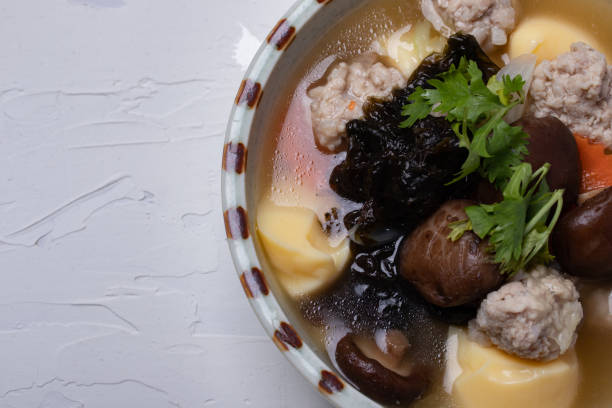 istock Clear Soup with Shiitake Mushrooms, Minced Pork and Seaweed 1312501329