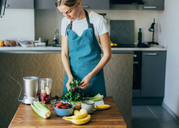 istock A Cook to prepare a vegan fruit smoothie in the home kitchen. 1312502753
