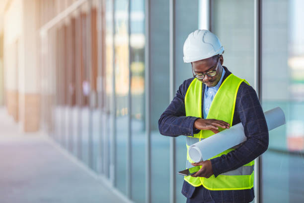istock Engineers man working on tablet plan building construction in city. 1312504061