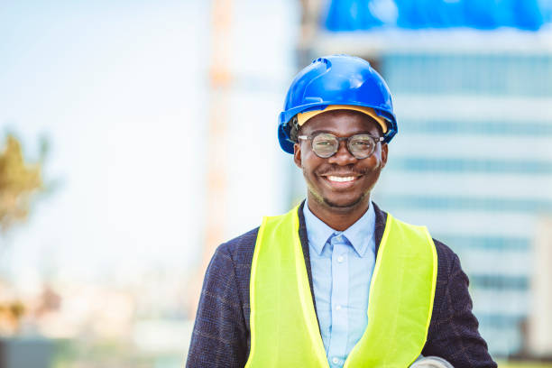 istock Portrait of smiling Engineer - Architect looking at camera. 1312504646