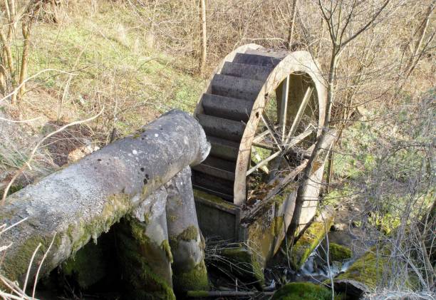 istock an old, unused water wheel 1312507288