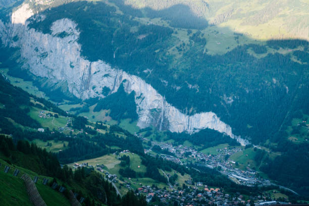 istock Elevated view of lush valley and village 1312508665