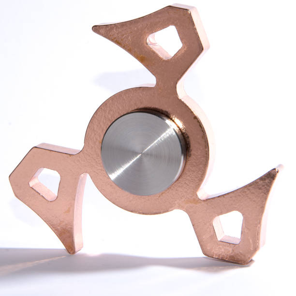 istock Fidget spinner to relax, relieve stress, play 1312508780