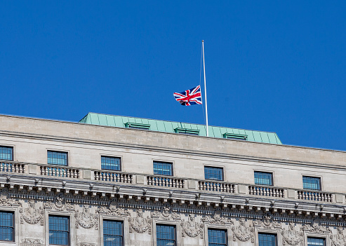 Sign of national mourning on the top of a classic building in central London