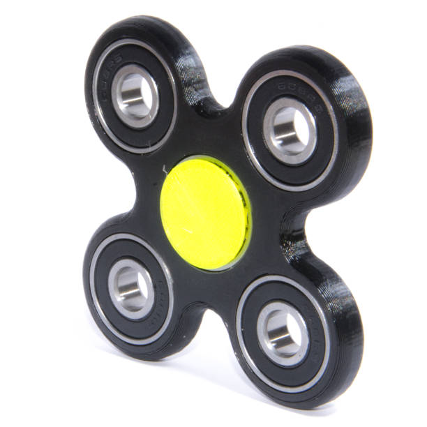 istock Fidget spinner to relax, relieve stress, play 1312508958