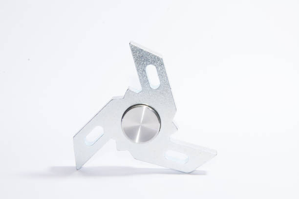 istock Fidget spinner to relax, relieve stress, play 1312509880