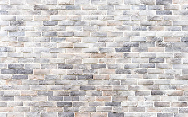 istock Seamless vertical white brick wall texture background of vintage brick wall  block 1312510320