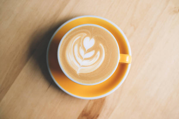 istock Fresh flavored coffee art is on the wooden table. 1312511073