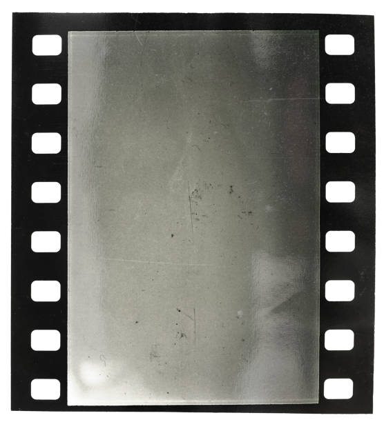 single 35mm film snip with blank or empty frame on white background and cool light reflection.