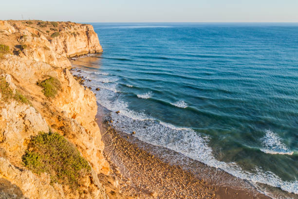istock Rocky cliffs near Lagos, Portug 1312520388