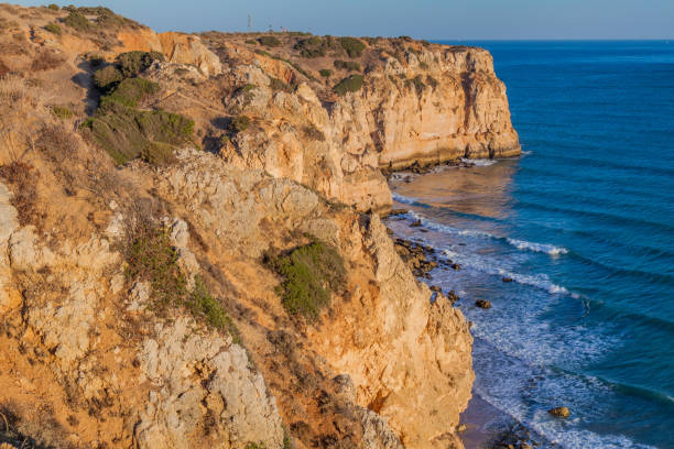 istock Rocky cliffs near Lagos, Portug 1312520392