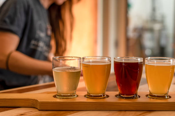 istock Ordering a flight of craft beer from a local brewery 1312526742
