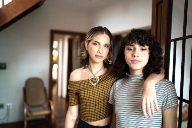 Portrait of a female transgender couple at home Portrait of a female transgender couple at home transgender person photos stock pictures, royalty-free photos & images