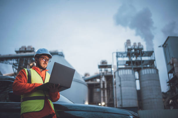 istock Young engineer working hard during night in oil and gas industry. 1312528295