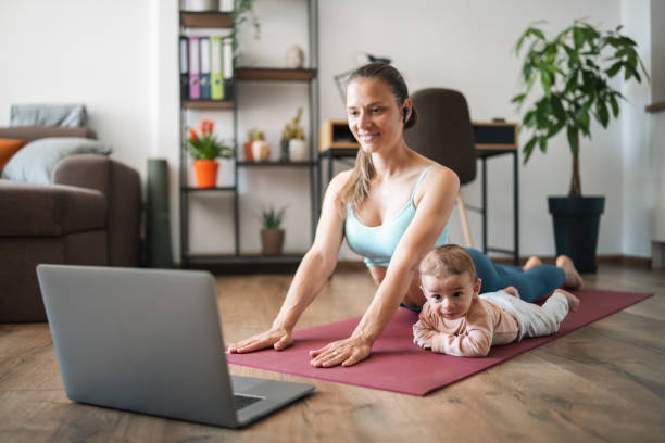 istock helping mommy to get in shape. 1312528309