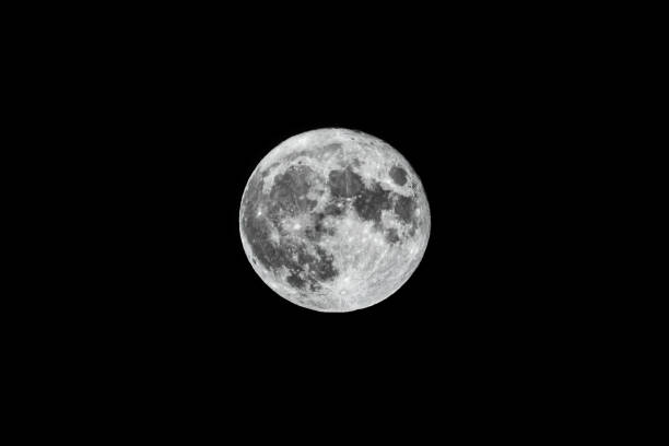 istock Super fool moon on black background, detailed image 1312530925