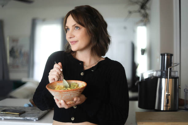 istock Woman eating a Plant-Based Diet 1312532137