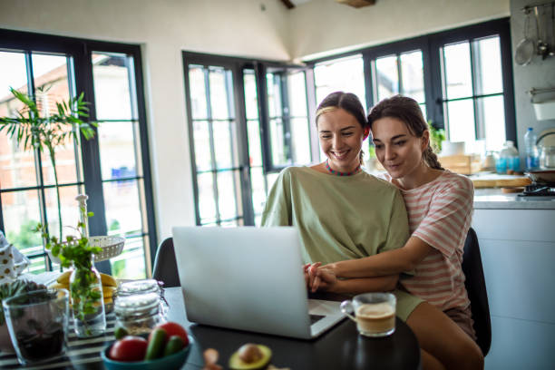 istock Lesbian couple working  at home 1312534438