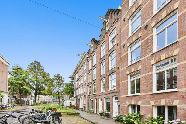 istock Old brick building exterior in residential district 1312539401