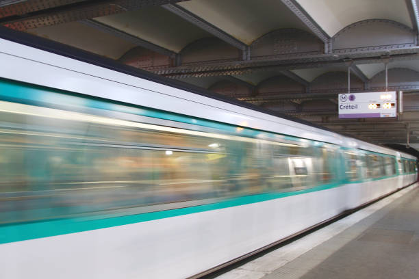 istock Subway Whizzing Past At A Paris Train Station 1312540474