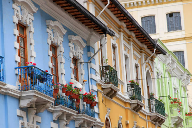 Colorful Houses with Iron Window Boxes and Flower in Quito, Ecuador