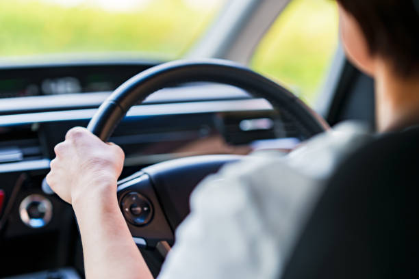 istock Japanese woman using car sharing service 1312549528