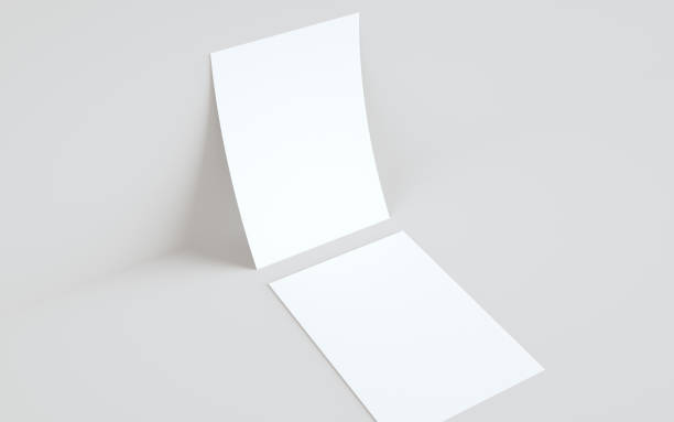 istock A4 Flyer / Letterhead Mock-Up - Two Flyers Against Wall Background 1312551952
