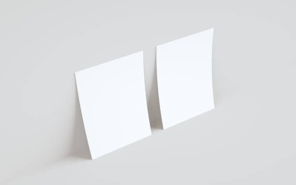 istock A5 Flyer / Brochure Mock-Up - Two Flyers Against Wall Background 1312551954