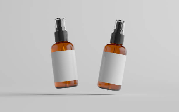 istock Amber Spray Bottle Mockup - Two Bottles. Blank Label 1312551970