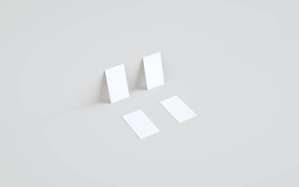 istock Business Card Mock-Up (3.5 x 2) Mock-Up - Two Cards Against Wall Background 1312551972