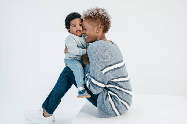 istock Mom hugging a baby 1312551982