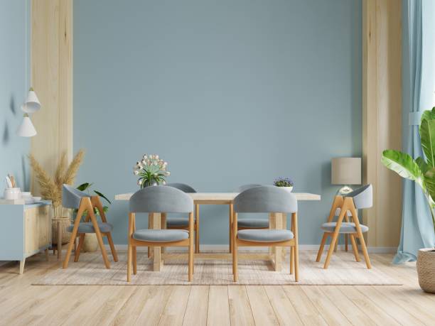 istock Modern dining room interior design with dark blue color wall. 1312560384