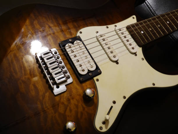 istock Close-up of an electric guitar in a quilted maple pattern 1312564757