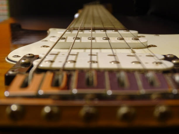 istock Close-up of an electric guitar in a quilted maple pattern 1312564761