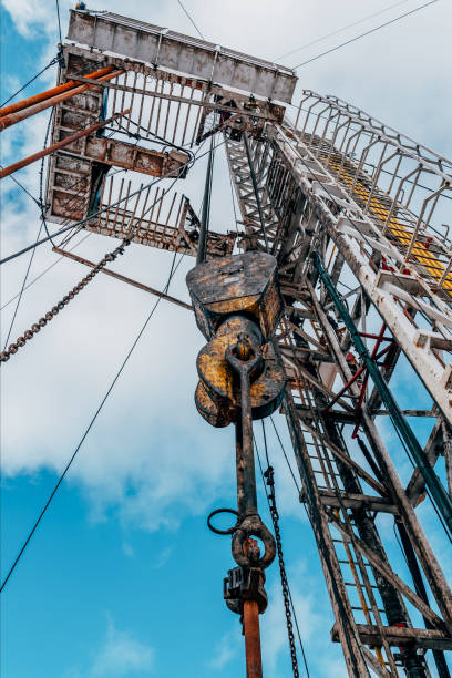 istock Drilling rig in oil field for drilled into subsurface in order to produced crude, inside view. Petroleum Industry. Onshore drilling rig. 1312567935
