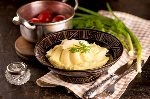 istock Mashed potatoes in bowl on wooden table 1312569412