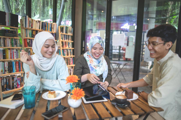 istock Asian friend in cafe 1312575463