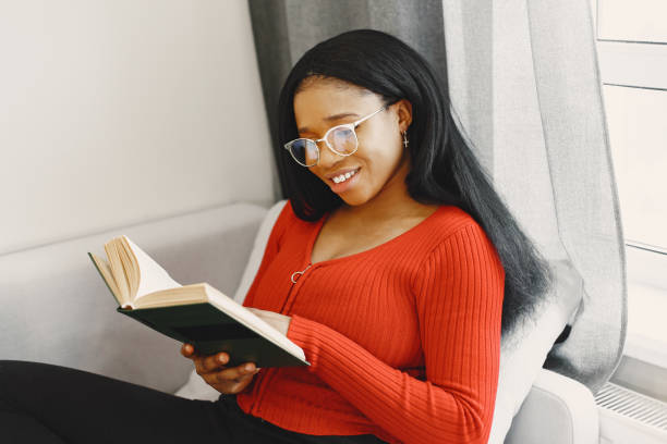 istock African woman spend time at home 1312576593