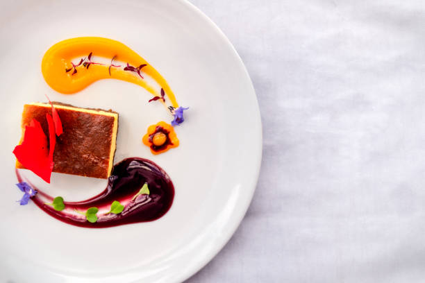 istock Sweet corn cheesecake with purple corn and mango sauces 1312576858
